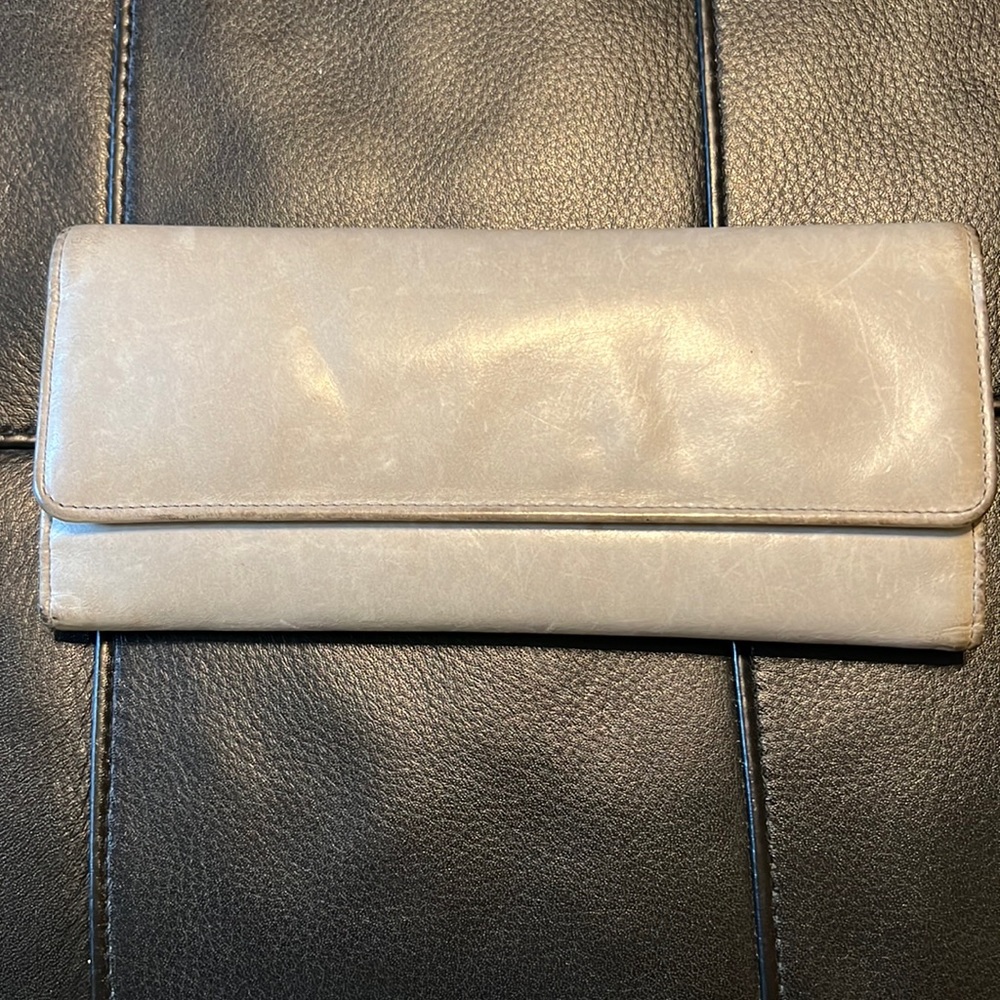 HOBO trifold leather wallet. Light gray. Barely used